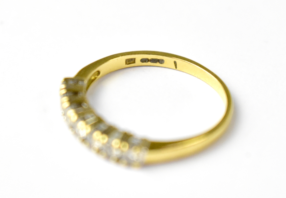 A 9ct gold half eternity ring with seven claw set diamonds, approx 0.5ct, size Q, approx 2.6g.