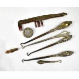A quantity of hallmarked silver to include a comb (af), five silver handled button hooks,
