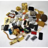 A quantity of lighters to include table lighters, Japanese Joysonic example, Crown, etc,