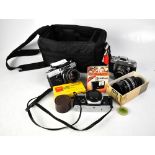 A collection of cameras and camera accessories to include an Exakta RTL1000,