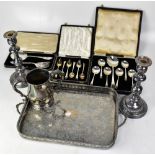 A quantity of silver plated ware to include a twin-handled tray with personalised centre,