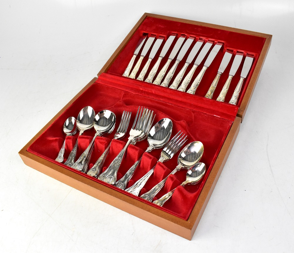 A six-setting canteen of silver plated cutlery in a red lined mahogany canteen.