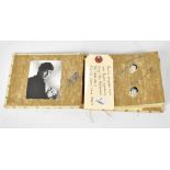 WITHDRAWN A cream autograph book containing signatures including Ringo Starr, Paul McCartney,