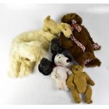A pair of mid-20th century nodding poodle dogs, a Snoopy cuddly toy, a c1950s straw-filled toy dog,