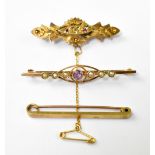 Three gold brooches comprising a simple 9ct gold bar brooch, length approx 4.5cm, approx 2.