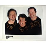 THE MONKEES; a colour photograph bearing the signatures of Peter Tork, Davy Jones and Mickey Dolenz,