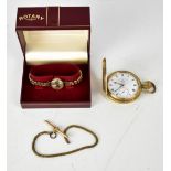 SEKONDA; a 9ct yellow gold ladies' wristwatch, the silvered dial set with Arabic numerals,