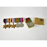 A WWII medal group comprising France and Germany Star, Africa Star, 1939-45 Star,