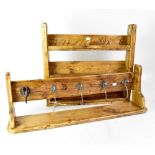 A group of eight handmade rustic household items, to include trays with rope handles,