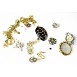 A quantity of jewellery to include a Victorian mourning hair brooch, a silver banded pendant, etc.