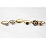 Six various dress rings, including five gold examples, some indistinctly marked,