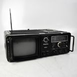 A Plustron TVRC 7, TV radio cassette recorder.