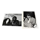 JAMES BROWN; three black and white photographs, each bearing the star's signature (3).