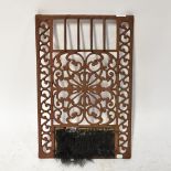 A Victorian cast iron front door bootscrape, with scroll design and original brushes for boots,