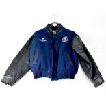 CANADA SPORTSWEAR; a Rooney commemorative jacket, blue wool with leather sleeves, with logos No.