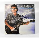 GEORGE HARRISON; 'Cloud Nine', an album bearing the megastar's signature to the cover.