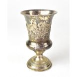 A mid/late 19th century silver Austro-Hungarian footed beaker with floral and scroll repoussé