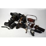 A collection of cameras and camera accessories to include a Kodak Retinette IB,