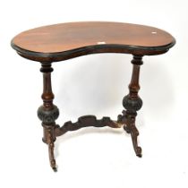 A Victorian rosewood kidney-shaped occasional table with ebonised rim,