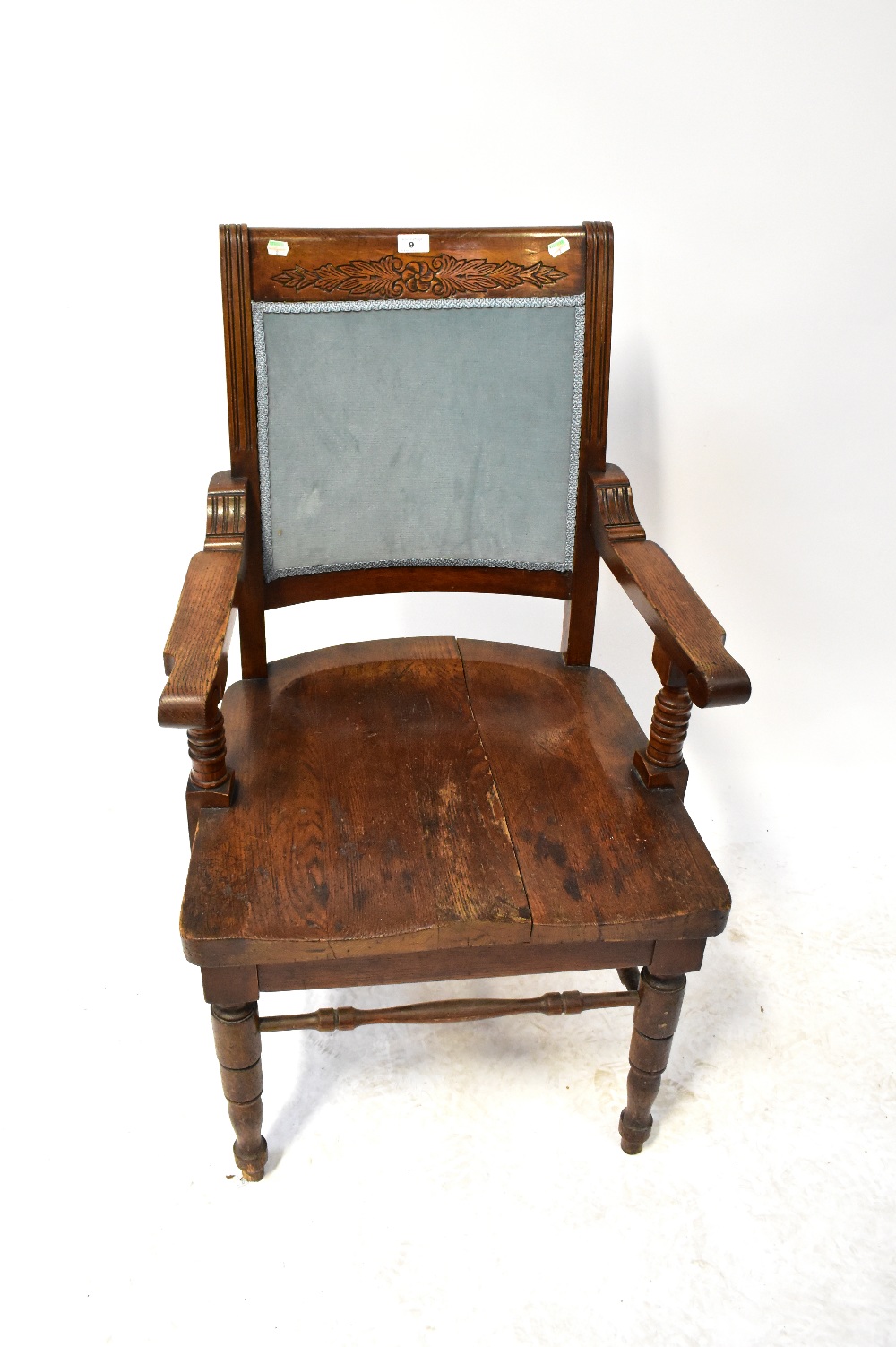 An early 20th century oak open arm elbow chair with saddle seat, - Image 2 of 2