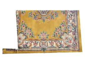 A large yellow ground Chinese Superwash carpet with all-over floral decoration, approx 277 x 181cm.