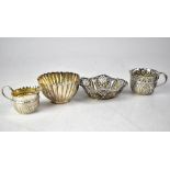 A hallmarked silver small cream jug with demi-gadrooned decoration, a silver fluted bowl,
