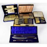 A quantity of cased flatware to include a James Deakin & Sons antler-handled carving set with