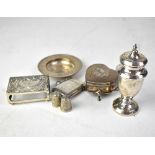 Various small silver items to include a vesta, a pin dish, a pepperette, a heart-shaped trinket box,