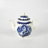 LIVERPOOL PORCELAIN; a c1800 blue and white teapot with Chinoiserie design of village and fishermen,