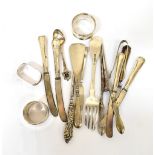 A small mixed lot of hallmarked silver items, comprising three napkin rings,