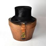 WOODROW; a vintage silk lined top hat marked with a royal crest above 'By Appointment Woodrow, 8,