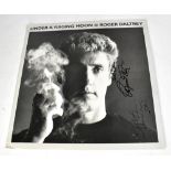 ROGER DALTREY; 'Under a Raging Moon' LP, bearing his signature.