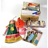 A mixed lot of various textiles and sewing equipment to include patterns,