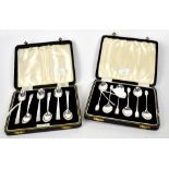 Two cased sets of hallmarked silver Art Deco coffee spoons of varying patterns,