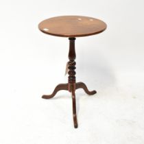 A 19th century mahogany tilt-top table to turned tripartite base, diameter 44cm.