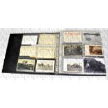 POSTCARD ALBUM; an album of vintage postcards and photographic images,