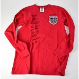 ENGLAND WORLD CUP WINNERS 1966; a vintage football shirt bearing the signatures of Roger Hunt,