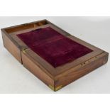 A late 19th/early 20th century mahogany brass bound writing slope.