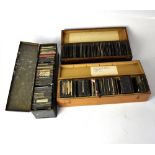 Three cases of vintage magic lantern slides, various subjects to include topographical, animals,