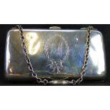 A George V hallmarked silver clutch purse, with ring and chain handle,