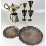A quantity of silver plated items to include two shaped trays, Champagne flutes, goblets, flatware,