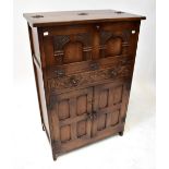 REPRODUX; a an oak drinks cabinet,