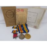 A pair of WWI medals awarded to Pte F Knight of the MGC 55651, with ribbons,