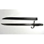 A WWII period Japanese Model 1897 Type 30 Arisaka bayonet with metal scabbard, overall length 52.