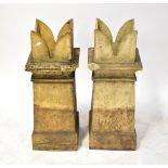 A pair of square section chimney stacks, heights 86cm (af) (2).