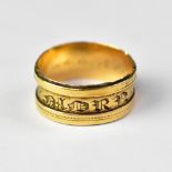 An early 19th century 18ct gold mourning band ring,