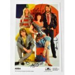 ABBA; a colour promotional photograph, bearing the band's signatures.