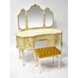 A French-style white painted part bedroom suite comprising a kidney-shaped dressing table with