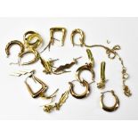 A quantity of various 9ct gold earrings including hoops and studs, combined approx 11.2g.