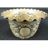 A Victorian hallmarked silver shallow bowl with Classical decoration and wavy edge,